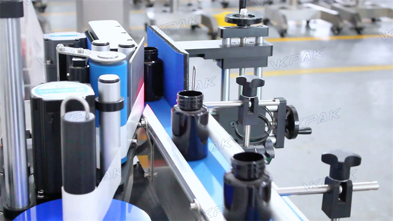 Mecanisme de rodatge d'etiquetes VK-TL