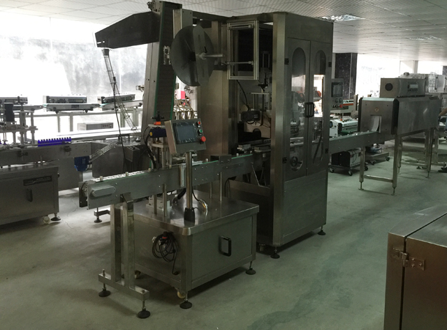 etiquetadora de màniga de cinta.jpg