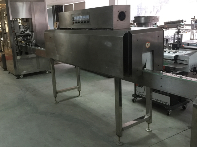 línia de segellat de taps shrinking.jpg