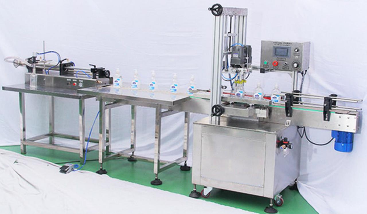 automatic screw capping machine màquina de tapa de cargol en línia.jpg