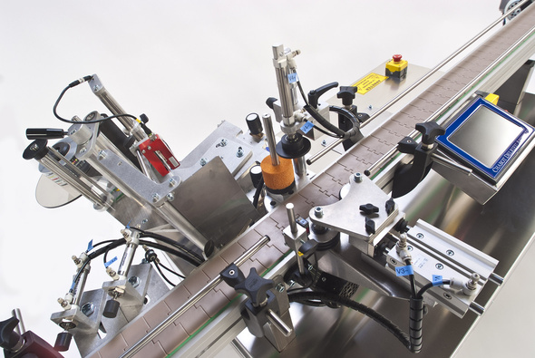 round bottle labeler equipment equip d'etiquetatge d'ampolles rodones.jpg