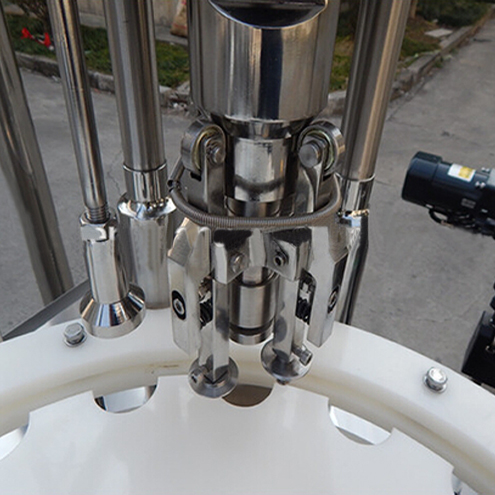 ropp capping heads for vial capper ampolles ROPP capping equipment.jpg