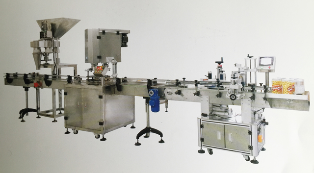 llaunes pop trucant a la màquina d'omplir part.jpg