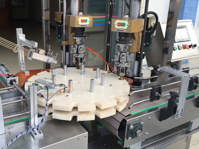 capping head cargol de doble cap capper.jpg