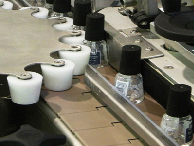 ampolles amb roda d'estrella rotativa per etiquetar.jpg