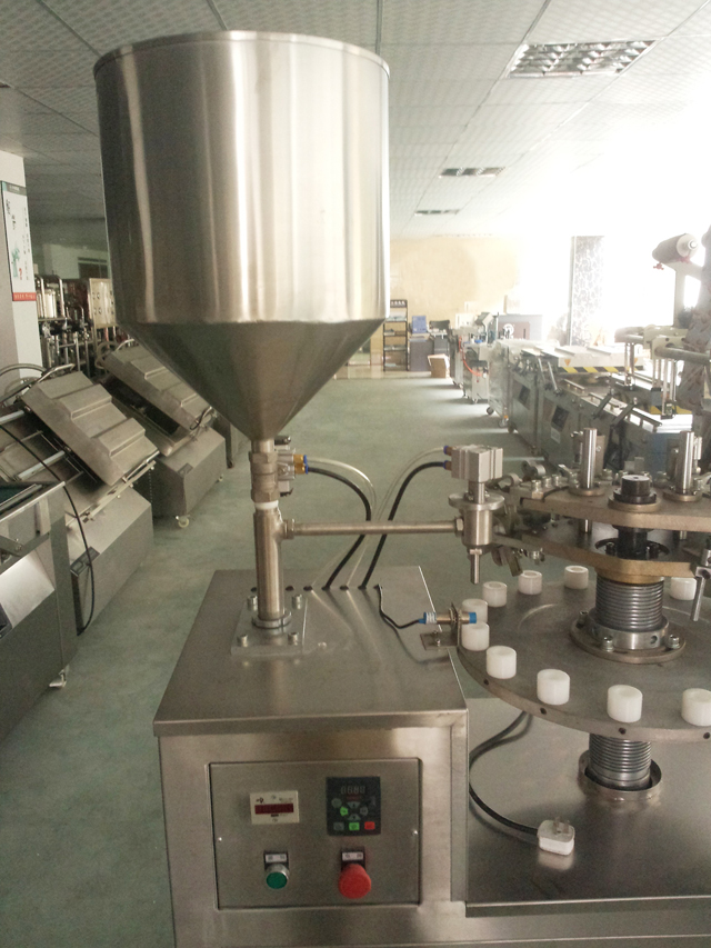 metal tubes filling sealing machine in stock segellador de farciment de tubs hopper.jpg