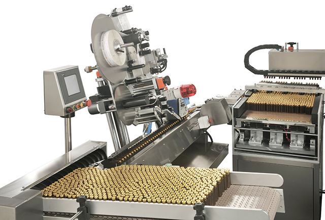 sistema d'alimentació introduint biberons.jpg