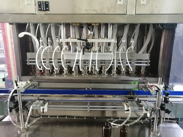 Màquina d'omplir 12 capçals amb escalfador de mescla (4).jpg