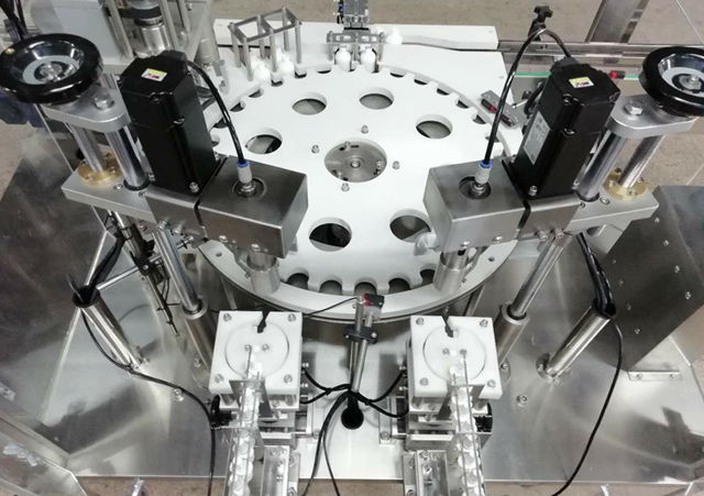 alimentador de braç robot d'ampolles.jpg