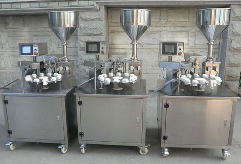 tubs rotatius que omplen màquines de segellat ultrasònics semiautomàtiques