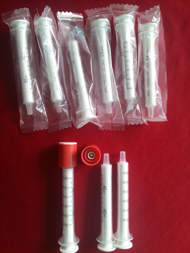 etiquetadora semiautomàtica amb pantalla tàctil per a xeringes.jp