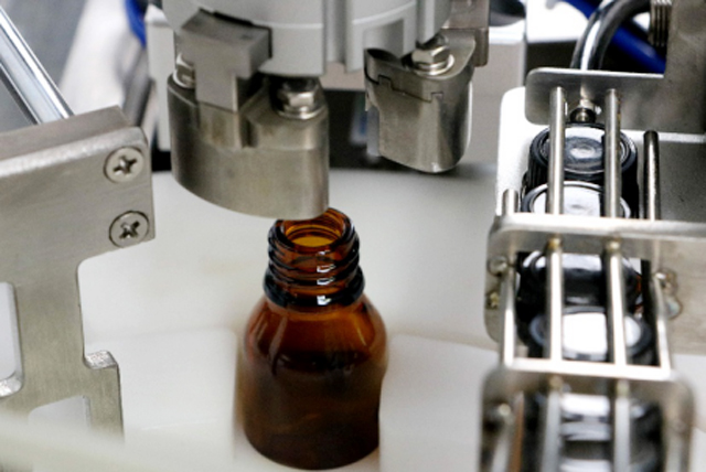 màquina d'ompliment d'ampolles d'oli tabletop.jpg